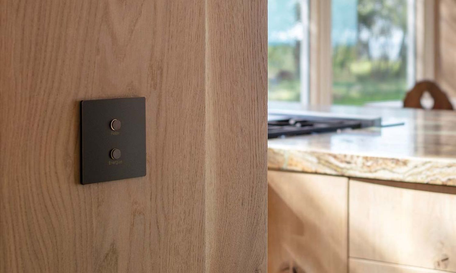 Lutron alisse keypad in a modern home on a wooden wall