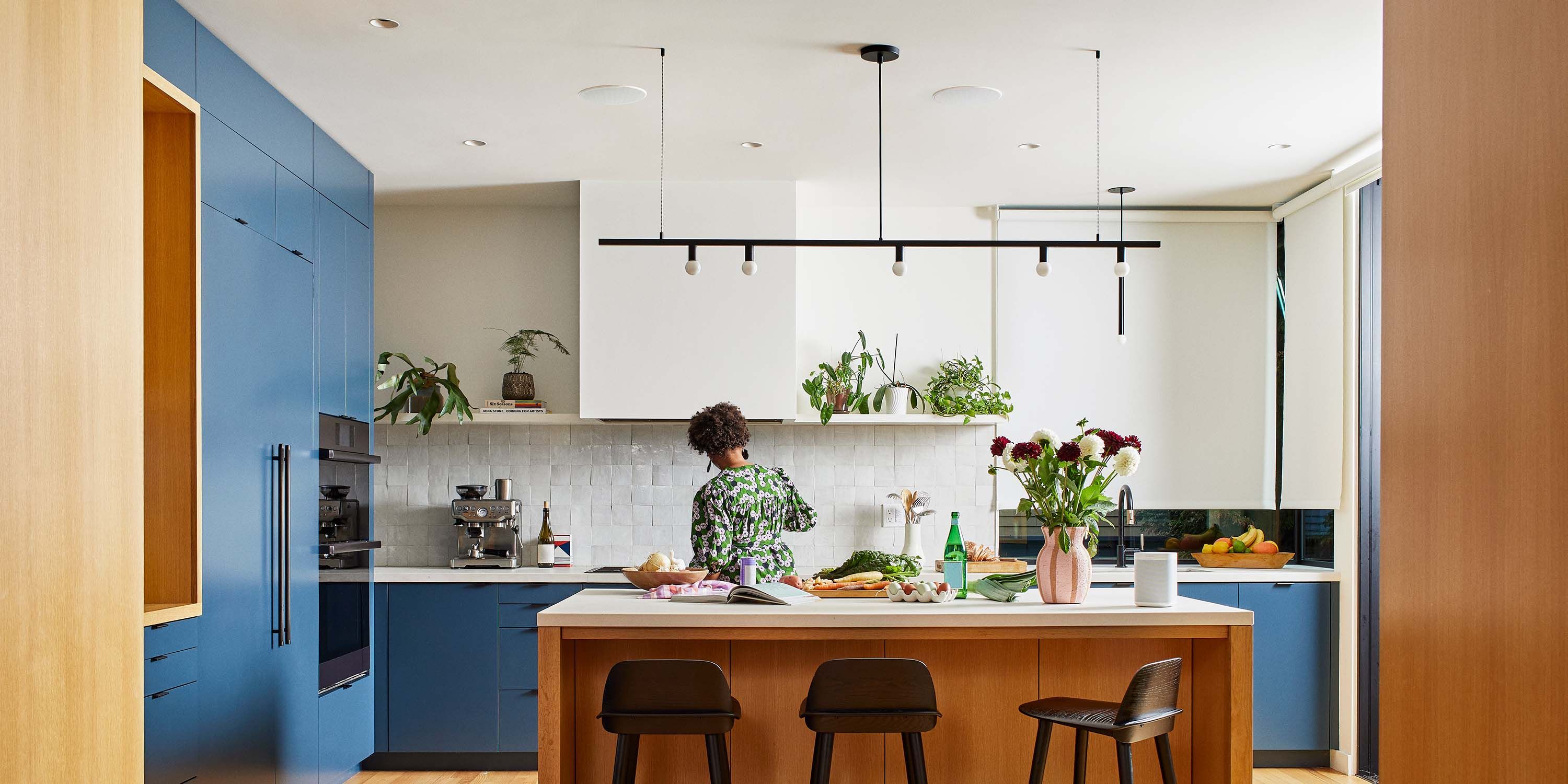 blue accents in a kitchen with sonos speakers architectural series